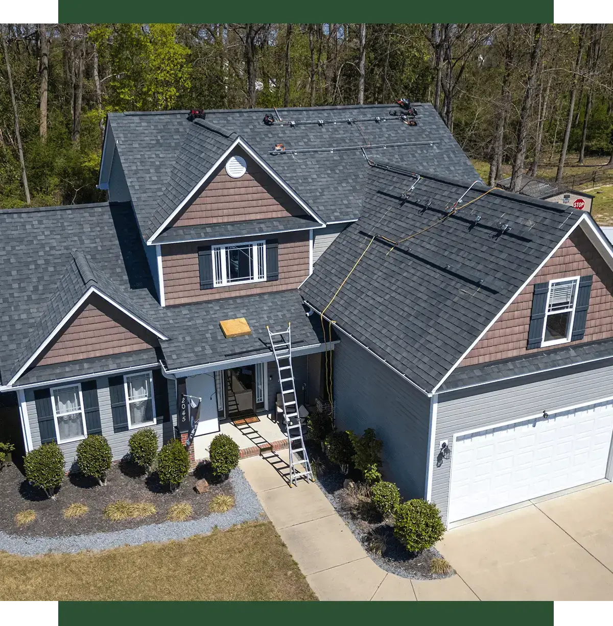 House with ladder for roof repair.