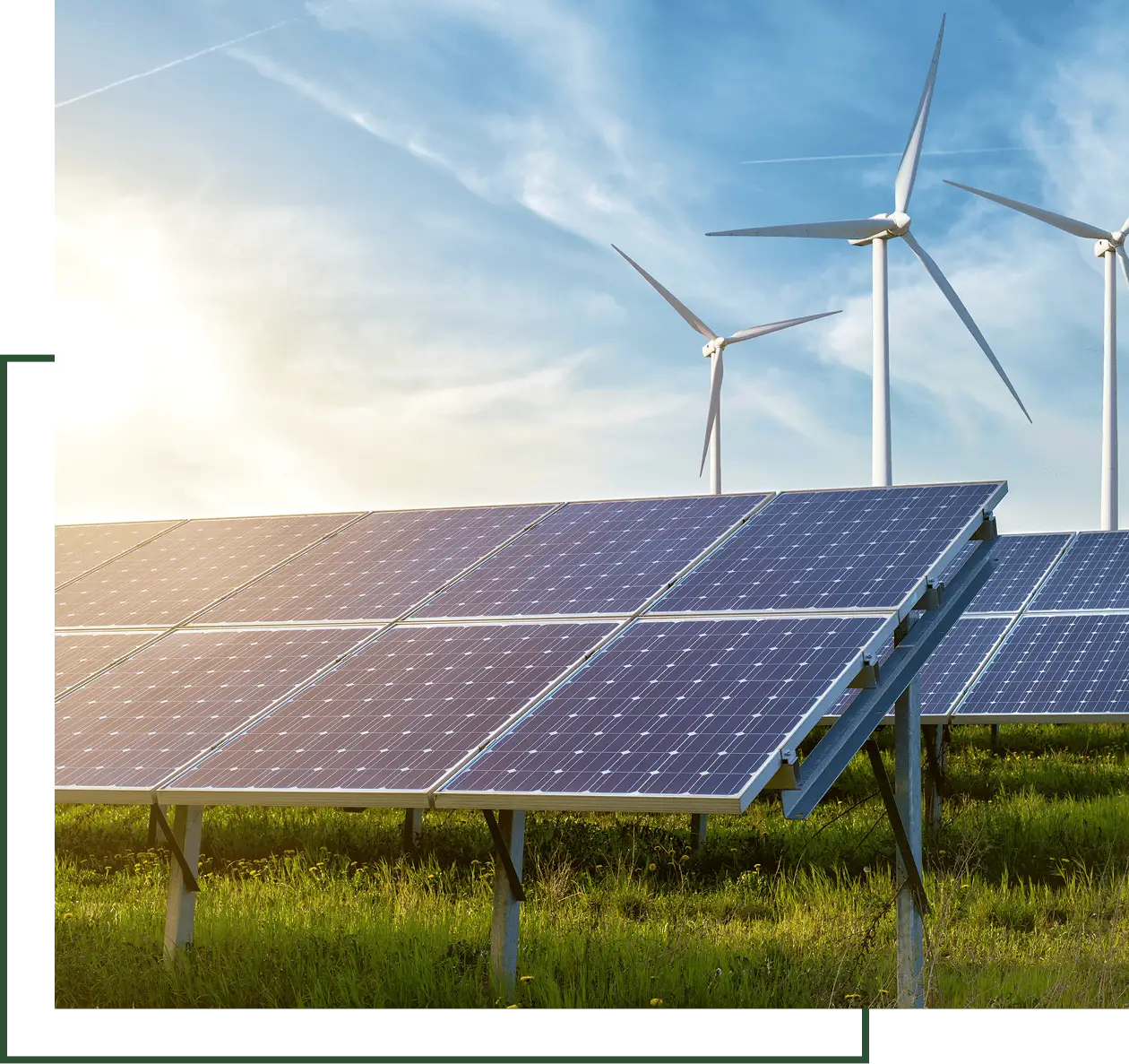 Sunlit photovoltaic array with windmills beyond