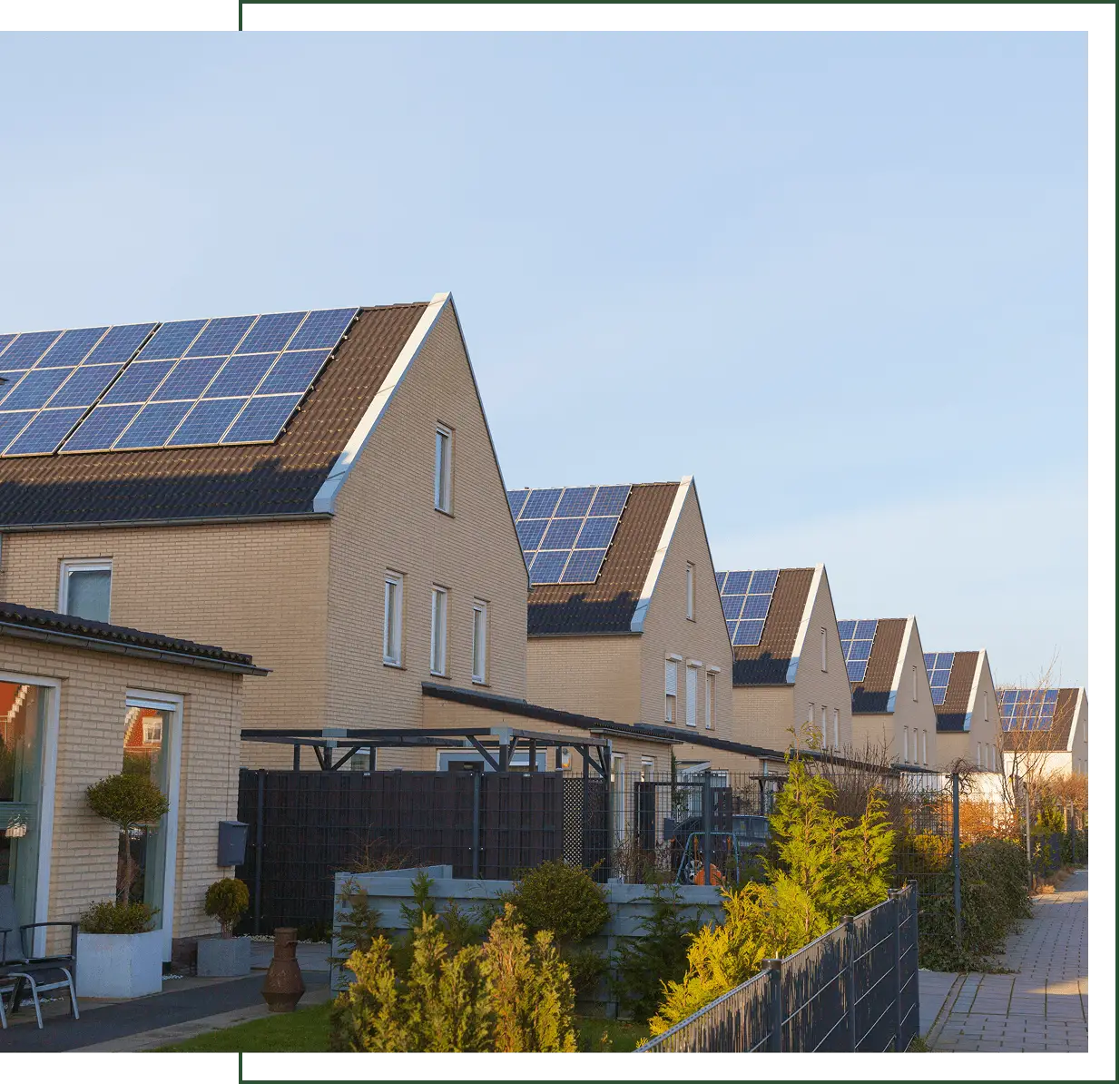 Row of houses with solar panels installed.